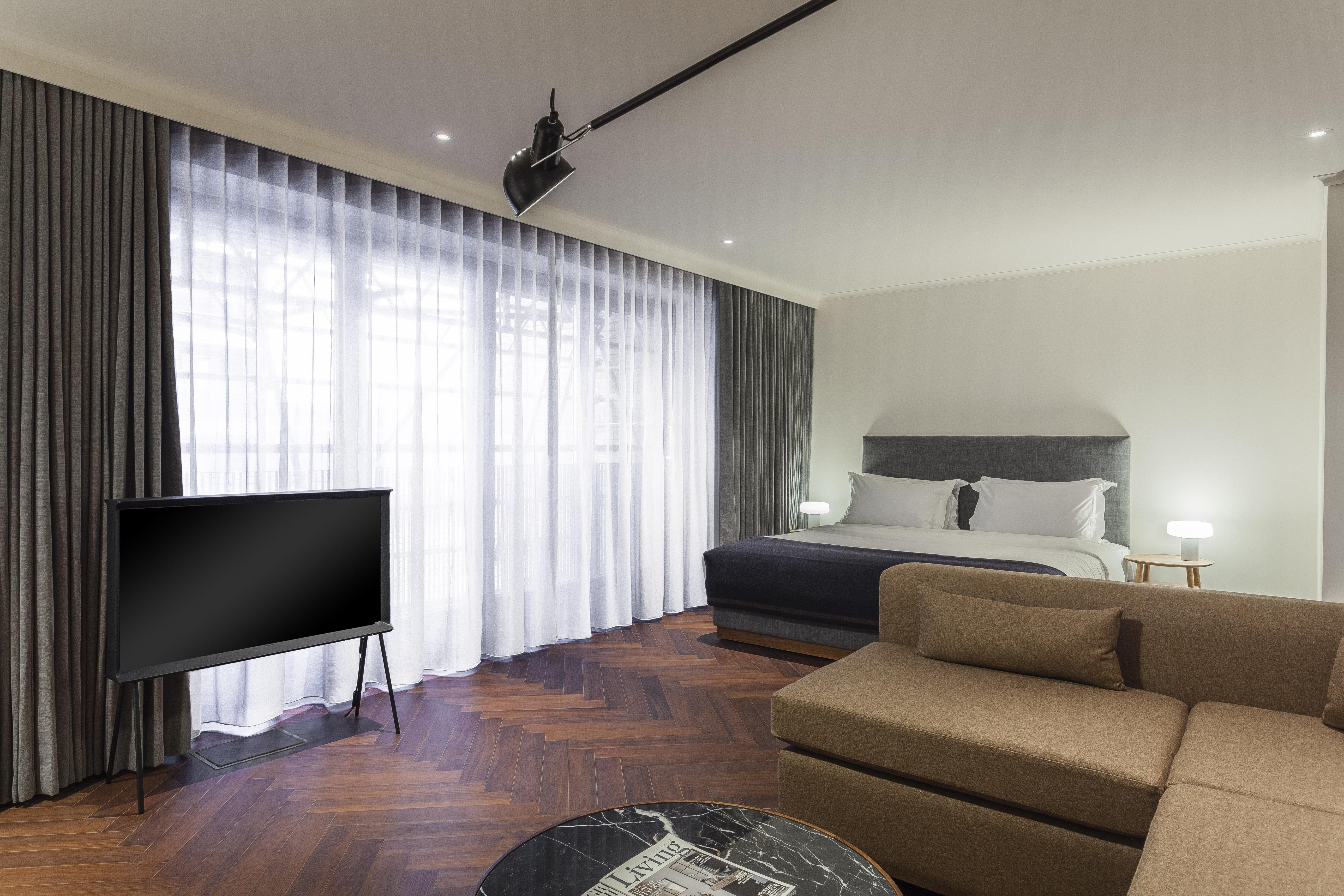 Отель The Roseate Ридинг Экстерьер фото A room at the hotel
