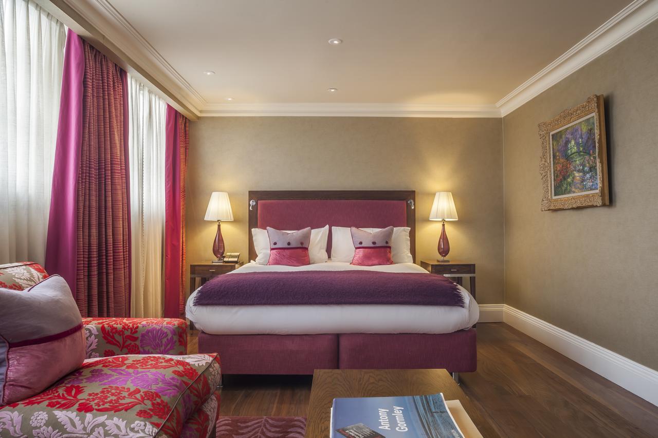 Отель The Roseate Ридинг Экстерьер фото A bedroom at the hotel